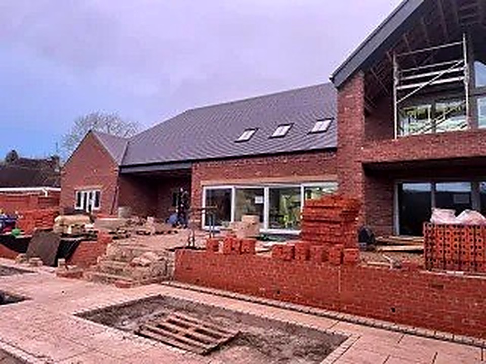 Brickwork and external steps under construction on a large private new build site
