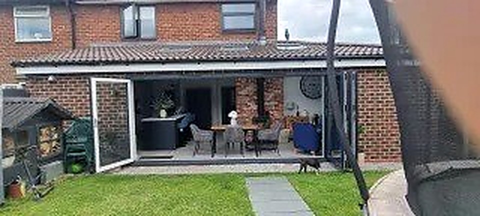 Open-plan kitchen and dining space inside a finished rear extension in Chesterfield