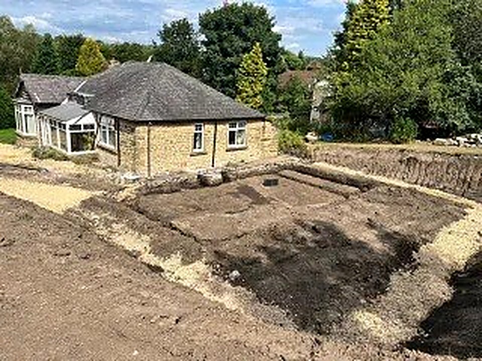Excavated groundworks and foundation dig alongside an existing bungalow in Chesterfield