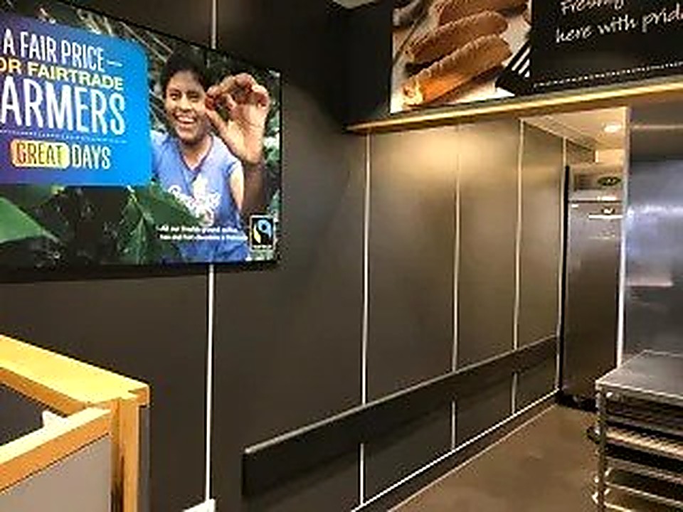 Commercial servery fit-out with dark wall panelling, Derbyshire
