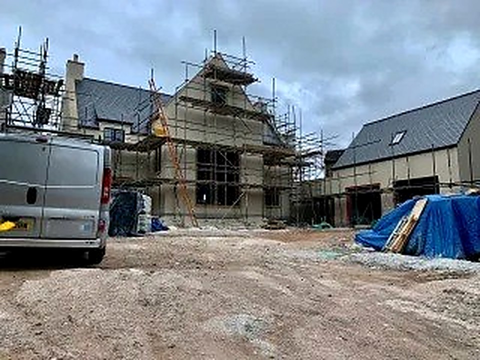Stone barn conversion under construction with full scaffolding near Chesterfield