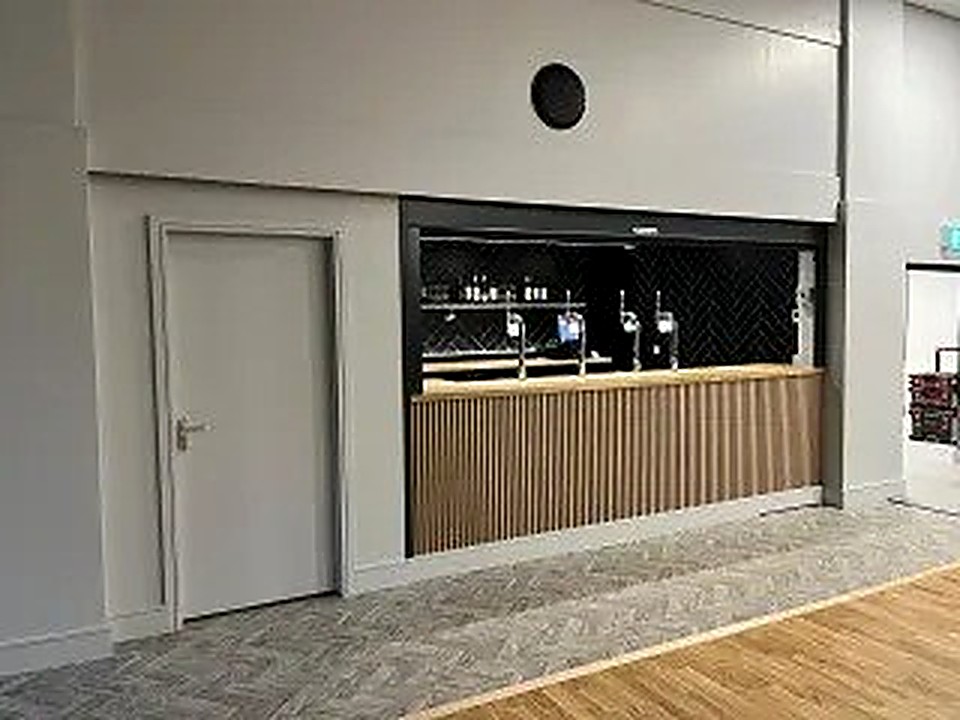 Finished pub interior with timber panelling and herringbone flooring in Chesterfield